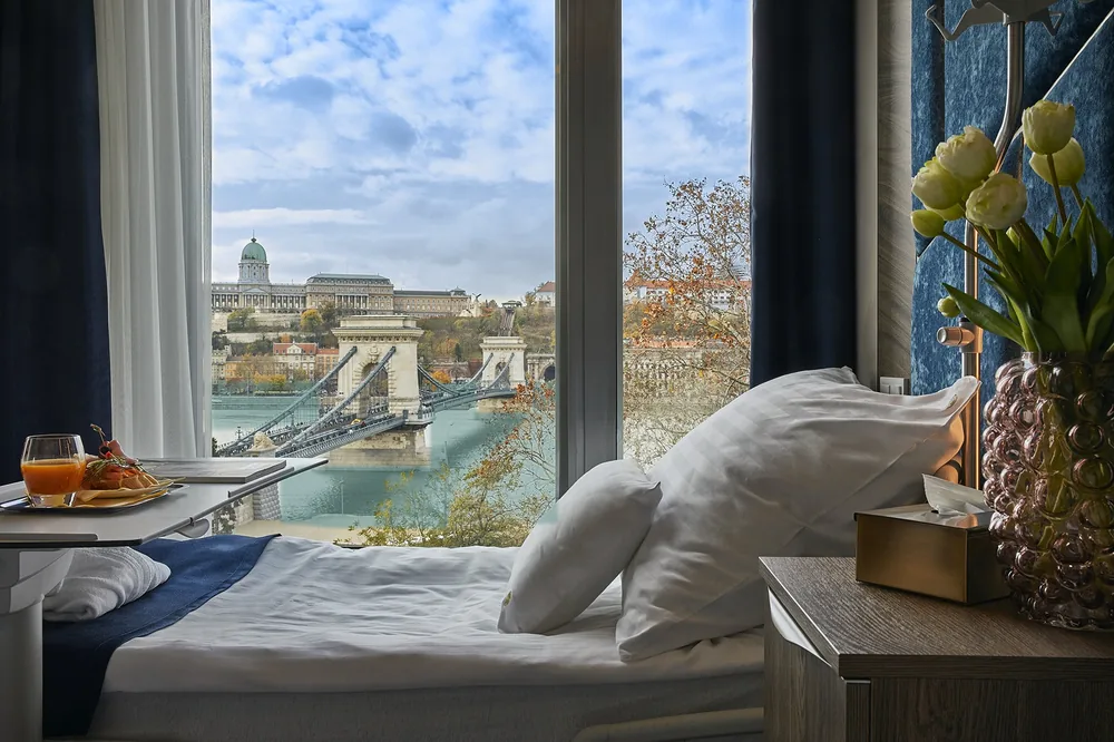 Breakfast by the window of a room at Dr. Rose, facing the Chain Bridge